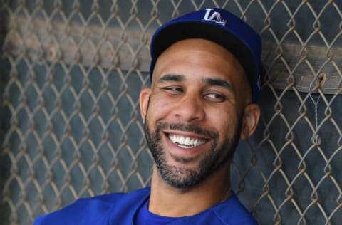 Feb 21, 2020; Glendale, Arizona, USA; Los Angeles Dodgers starting pitcher David Price (33) sits in the dugout during spring training at Camelback Ranch. Mandatory Credit: Jayne Kamin-Oncea-USA TODAY Sports