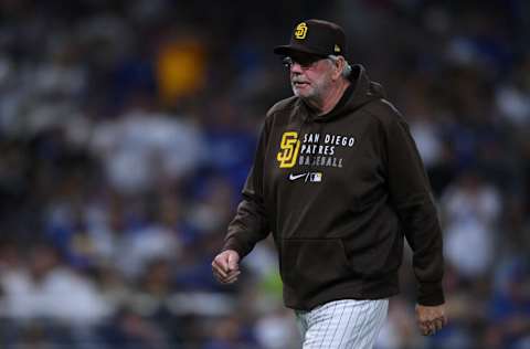 Jun 21, 2021; San Diego, California, USA; San Diego Padres pitching coach Larry Rothschild (38) walks to the dugout during the seventh inning against the Los Angeles Dodgers at Petco Park. Mandatory Credit: Orlando Ramirez-USA TODAY Sports