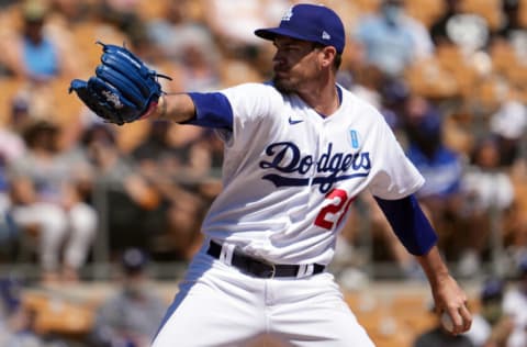 Mar 27, 2022; Phoenix, Arizona, USA; Los Angeles Dodgers starting pitcher Andrew Heaney (28) pitches against the Chicago White Sox during the first inning of a spring training game at Camelback Ranch-Glendale. Mandatory Credit: Joe Camporeale-USA TODAY Sports