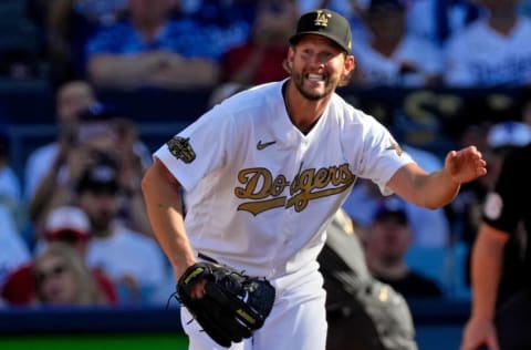 Jul 19, 2022; Los Angeles, California, USA; National League starting pitcher Clayton Kershaw (22) of the Los Angeles Dodgers reacts after giving up a single to American League pitcher/designated hitter Shohei Ohtani (17) of the Los Angeles Angels during the first inning in the 2022 MLB All Star Game at Dodger Stadium. Mandatory Credit: Robert Hanashiro-USA TODAY Sports