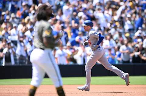 Apr 24, 2022; San Diego, California, USA; Los Angeles Dodgers first baseman Freddie Freeman (5) rounds the bases after hitting a two-run home run as San Diego Padres starting pitcher Sean Manaea (left) looks on during the third inning at Petco Park. Mandatory Credit: Orlando Ramirez-USA TODAY Sports