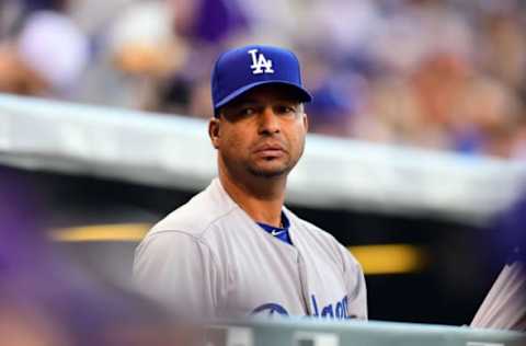 Apr 8, 2017; Denver, CO, USA; Los Angeles Dodgers manager Dave Roberts (30) delivers before the game against the Colorado Rockies at Coors Field. Mandatory Credit: Ron Chenoy-USA TODAY Sports