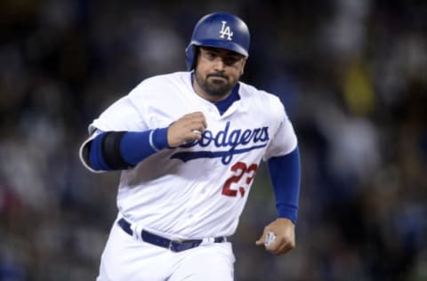 April 14, 2017; Los Angeles, CA, USA; Los Angeles Dodgers first baseman Adrian Gonzalez (23) reaches third in the third inning against the Arizona Diamondbacks at Dodger Stadium. Mandatory Credit: Gary A. Vasquez-USA TODAY Sports