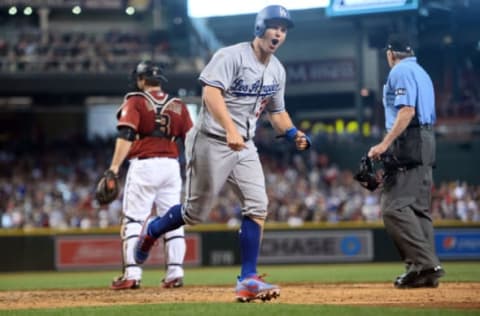 Apr 23, 2017; Phoenix, AZ, USA; Los Angeles Dodgers center fielder Joc Pederson (31) celebrates after scoring a run against the Arizona Diamondbacks during the fifth inning at Chase Field. Mandatory Credit: Joe Camporeale-USA TODAY Sports