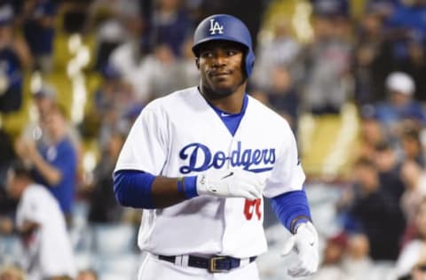 Apr 29, 2017; Los Angeles, CA, USA; Los Angeles Dodgers right fielder Yasiel Puig (66) reacts after hitting a solo home run against the Philadelphia Phillies during the ninth inning at Dodger Stadium. Mandatory Credit: Kelvin Kuo-USA TODAY Sports