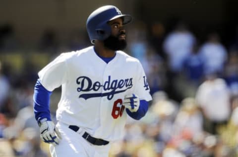 April 30, 2017; Los Angeles, CA, USA; Los Angeles Dodgers center fielder Andrew Toles (60) runs after he hits a three run home run in the sixth inning against the Philadelphia Phillies at Dodger Stadium. Mandatory Credit: Gary A. Vasquez-USA TODAY Sports