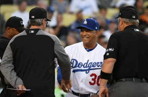 May 1, 2017; Los Angeles, CA, USA; San Francisco Giants manager Bruce Bochy (15) and Los Angeles Dodgers manager Dave Roberts (30) shake hands before the game at Dodger Stadium. Mandatory Credit: Richard Mackson-USA TODAY Sports