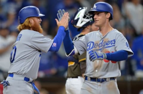 May 5, 2017; San Diego, CA, USA; Los Angeles Dodgers left fielder Cody Bellinger (35) is congratulated by third baseman Justin Turner (10) after hitting a three run home run during the ninth inning against the San Diego Padres at Petco Park. Mandatory Credit: Jake Roth-USA TODAY Sports