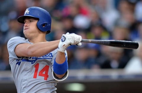 May 6, 2017; San Diego, CA, USA; Los Angeles Dodgers center fielder Enrique Hernandez (14) hits a two-RBI double during the fifth inning against the San Diego Padres at Petco Park. Mandatory Credit: Jake Roth-USA TODAY Sports