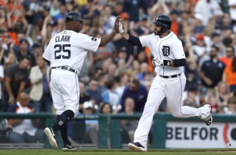 Jun 2, 2017; Detroit, MI, USA; Detroit Tigers right fielder J.D. Martinez (28) celebrates with third base coach Dave Clark (25) after hitting a one run home run during the third inning against the Chicago White Sox at Comerica Park. Mandatory Credit: Raj Mehta-USA TODAY Sports