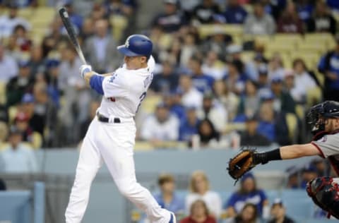 June 6, 2017; Los Angeles, CA, USA; Los Angeles Dodgers second baseman Chase Utley (26) hits a single in the first inning against the Washington Nationals at Dodger Stadium. Mandatory Credit: Gary A. Vasquez-USA TODAY Sports