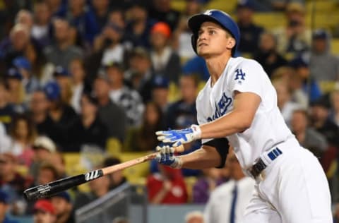 Jun 10, 2017; Los Angeles, CA, USA; Los Angeles Dodgers shortstop Corey Seager (5) hits a walk-off RBI single in the ninth inning of the game against the Cincinnati Reds at Dodger Stadium. Mandatory Credit: Jayne Kamin-Oncea-USA TODAY Sports