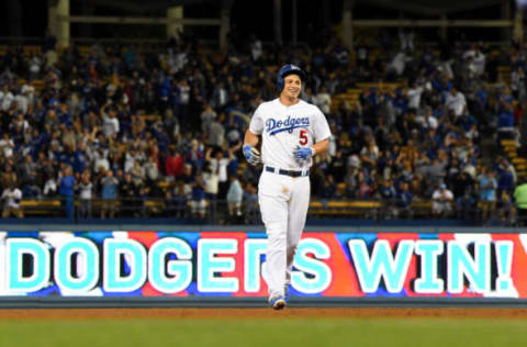 Jun 10, 2017; Los Angeles, CA, USA; Los Angeles Dodgers shortstop Corey Seager (5) on the field after hitting walk-off RBI single in the ninth inning of the game against the Cincinnati Reds at Dodger Stadium. Mandatory Credit: Jayne Kamin-Oncea-USA TODAY Sports