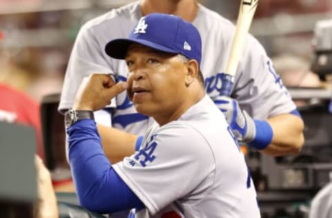 Jun 16, 2017; Cincinnati, OH, USA; Los Angeles Dodgers manager Dave Roberts watches during the ninth inning against the Cincinnati Reds at Great American Ball Park. Mandatory Credit: David Kohl-USA TODAY Sports