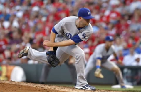 Jun 16, 2017; Cincinnati, OH, USA; Los Angeles Dodgers starting pitcher Alex Wood releases a pitch against the Cincinnati Reds during the eighth inning at Great American Ball Park. Mandatory Credit: David Kohl-USA TODAY Sports