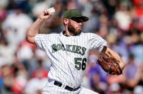 May 28, 2017; Denver, CO, USA; Colorado Rockies relief pitcher Greg Holland (56) delivers a pitch in the ninth inning against the St. Louis Cardinals at Coors Field. Mandatory Credit: Isaiah J. Downing-USA TODAY Sports