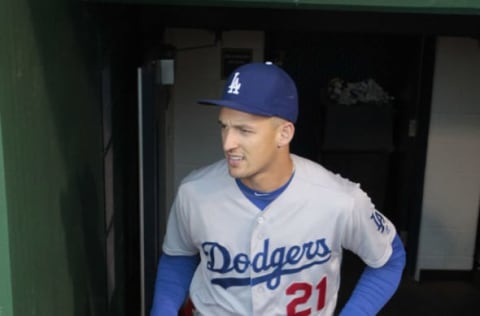 Jun 24, 2016; Pittsburgh, PA, USA; Los Angeles Dodgers outfielder Trayce Thompson (21) enters the dugout prior to the game against the Pittsburgh Pirates at PNC Park. Mandatory Credit: Charles LeClaire-USA TODAY Sports