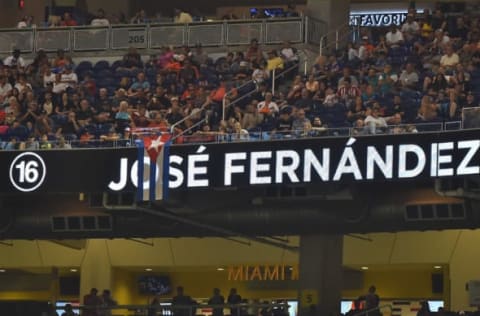 Sep 26, 2016; Miami, FL, USA; A Cuban flag hangs over the video board honoring Miami Marlins starting pitcher Jose Fernandez at Marlins Park. Mandatory Credit: Jasen Vinlove-USA TODAY Sports