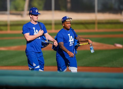 Feb 16, 2017; Glendale, AZ, USA; Los Angeles Dodgers first baseman Cody Bellinger (left) and second baseman Willie Calhoun during a Spring Training practice at Camelback Ranch. Mandatory Credit: Mark J. Rebilas-USA TODAY Sports