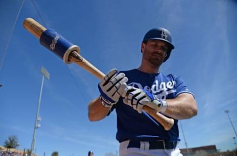 Mar 7, 2017; Phoenix, AZ, USA; Los Angeles Dodgers second baseman Logan Forsythe (11) waits on deck against the San Francisco Giants during the first inning at Camelback Ranch. Mandatory Credit: Joe Camporeale-USA TODAY Sports