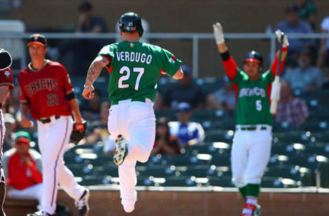 Mar 8, 2017; Salt River Pima-Maricopa, AZ, USA; Mexico base runner Alex Verdugo scores in the first inning against the Arizona Diamondbacks during a 2017 World Baseball Classic exhibition game at Salt River Fields. Mandatory Credit: Mark J. Rebilas-USA TODAY Sports