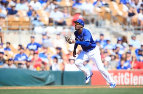 Mar 11, 2017; Phoenix, AZ, USA; Los Angeles Dodger infielder Darnell Sweeney (37) reacts during a spring training game against the Los Angeles Angels at Camelback Ranch. Mandatory Credit: Allan Henry-USA TODAY Sports