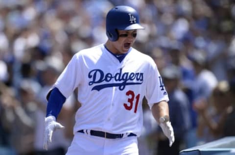 April 3, 2017; Los Angeles, CA, USA; Los Angeles Dodgers center fielder Joc Pederson (31) reacts after hitting a grand slam home run in the third inning against the San Diego Padres during the opening day game at Dodger Stadium. Mandatory Credit: Gary A. Vasquez-USA TODAY Sports