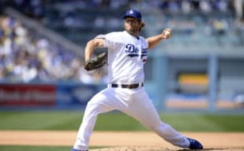 April 3, 2017; Los Angeles, CA, USA; Los Angeles Dodgers starting pitcher Clayton Kershaw (22) thrpws in the fifth inning against the San Diego Padres during the opening day game at Dodger Stadium. Mandatory Credit: Gary A. Vasquez-USA TODAY Sports