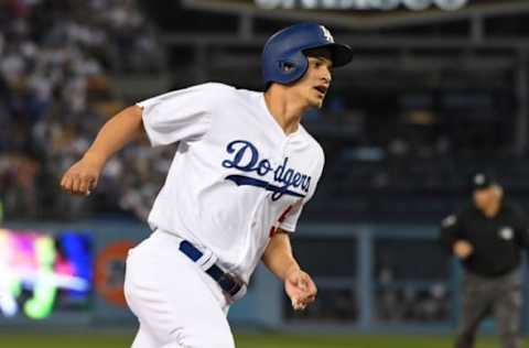 Apr 5, 2017; Los Angeles, CA, USA: Los Angeles Dodgers shortstop Corey Seager (5) rounds third base to score in the first inning against the San Diego Padres during a MLB baseball game at Dodger Stadium. Mandatory Credit: Kirby Lee-USA TODAY Sports