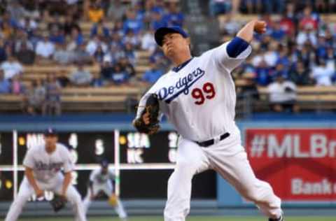 Los Angeles, CA, USA; Los Angeles Dodgers starting pitcher Hyun-Jin Ryu (99) pitches in the first inning of the game against the San Diego Padres at Dodger Stadium. Mandatory Credit: Jayne Kamin-Oncea-USA TODAY Sports