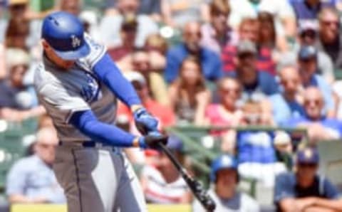 Jun 30, 2016; Milwaukee, WI, USA; Los Angeles Dodgers center fielder Trayce Thompson (21) hits a two run home run in the second inning against the Milwaukee Brewers at Miller Park. Mandatory Credit: Benny Sieu-USA TODAY Sports