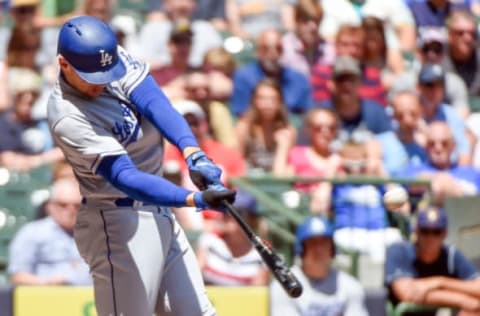 Jun 30, 2016; Milwaukee, WI, USA; Los Angeles Dodgers center fielder Trayce Thompson (21) hits a two run home run in the second inning against the Milwaukee Brewers at Miller Park. Mandatory Credit: Benny Sieu-USA TODAY Sports