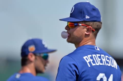 Mar 20, 2017; Goodyear, AZ, USA; Los Angeles Dodgers center fielder Joc Pederson (31) blows a bubble before the game against the Cleveland Indians at Goodyear Ballpark. Mandatory Credit: Jake Roth-USA TODAY Sports