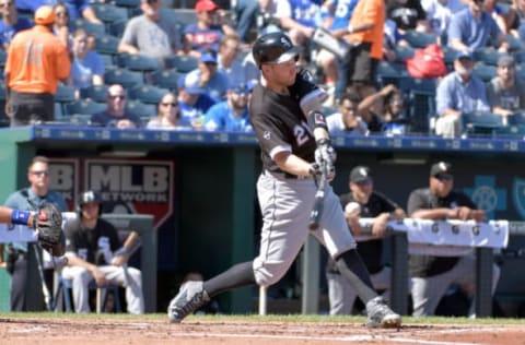 Sep 19, 2016; Kansas City, MO, USA; Chicago White Sox third baseman Todd Frazier (21) hits a one run single in the second inning against the Kansas City Royals at Kauffman Stadium. Mandatory Credit: Denny Medley-USA TODAY Sports