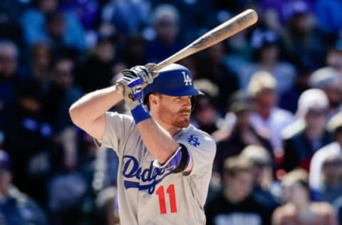 Apr 9, 2017; Denver, CO, USA; Los Angeles Dodgers second baseman Logan Forsythe (11) bats in the sixth inning against the Colorado Rockies at Coors Field. Mandatory Credit: Isaiah J. Downing-USA TODAY Sports