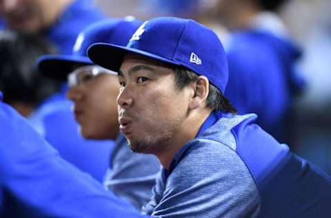 May 13, 2017; Denver, CO, USA; Los Angeles Dodgers starting pitcher Kenta Maeda (18) on the bench in the eighth inning against the Colorado Rockies at Coors Field. Mandatory Credit: Ron Chenoy-USA TODAY Sports