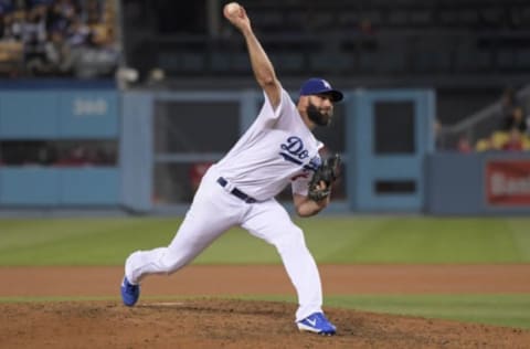 May 24, 2017; Los Angeles, CA, USA; Los Angeles Dodgers pitcher Chris Hatcher (41) delivers a pitch against the St. Louis Cardinals during an MLB baseball game at Dodger Stadium. The Cardinals defeated the Dodgers 6-1. Mandatory Credit: Kirby Lee-USA TODAY Sports