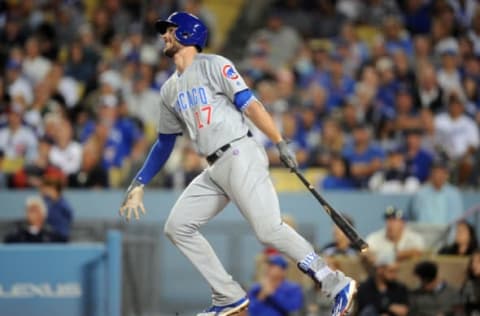 August 26, 2016; Los Angeles, CA, USA; Chicago Cubs third baseman Kris Bryant (17) hits a solo home run in the eighth inning against Los Angeles Dodgers at Dodger Stadium. Mandatory Credit: Gary A. Vasquez-USA TODAY Sports