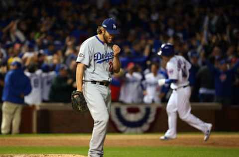 Oct 22, 2016; Chicago, IL, USA; Los Angeles Dodgers starting pitcher Clayton Kershaw (22) reacts after giving up a solo home run to Chicago Cubs catcher Willson Contreras (40) during the fourth inning of game six of the 2016 NLCS playoff baseball series at Wrigley Field. Mandatory Credit: Jerry Lai-USA TODAY Sports