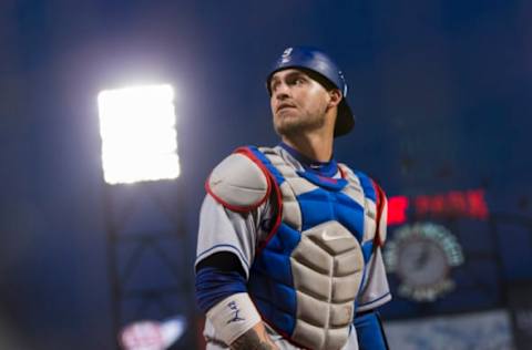 Apr 24, 2017; San Francisco, CA, USA; Los Angeles Dodgers catcher Yasmani Grandal (9) chases a fly ball against the San Francisco Giants in the third inning at AT&T Park. Mandatory Credit: John Hefti-USA TODAY Sports