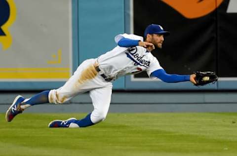 May 25, 2017; Los Angeles, CA, USA; Los Angeles Dodgers second baseman Chris Taylor (3) makes a diving catch off a ball hit by St. Louis Cardinals center fielder Dexter Fowler (25) in the seventh inning at Dodger Stadium. Mandatory Credit: Jayne Kamin-Oncea-USA TODAY Sports