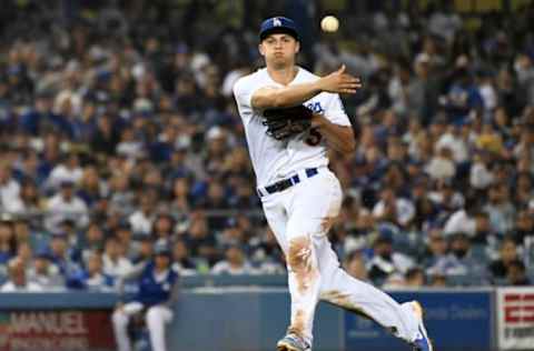 Jun 5, 2017; Los Angeles, CA, USA; Los Angeles Dodgers shortstop Corey Seager (5) throws out Washington Nationals right fielder Ryan Raburn (18, not pictured) in the fifth inning at Dodger Stadium. Mandatory Credit: Richard Mackson-USA TODAY Sports