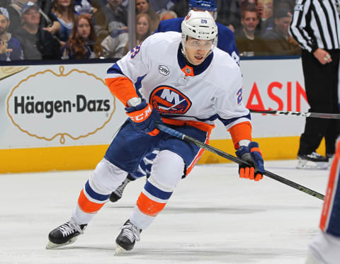 TORONTO, ON – DECEMBER 29: Michael Dal Colle #28 of the New York Islanders skates against the Toronto Maple Leafs during an NHL game at Scotiabank Arena on December 29, 2018 in Toronto, Ontario, Canada. The Islanders defeated the Maple Leafs 4-0.(Photo by Claus Andersen/Getty Images)