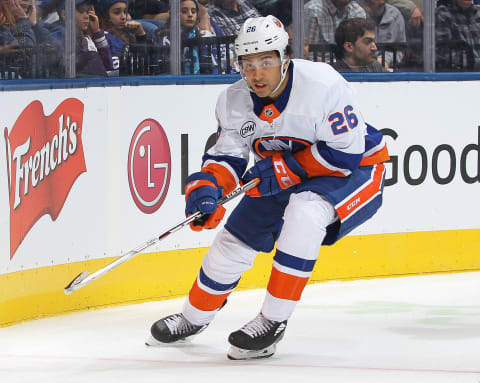 TORONTO, ON – DECEMBER 29: Josh Ho-Sang #26 of the New York Islanders skates against the Toronto Maple Leafs during an NHL game at Scotiabank Arena on December 29, 2018 in Toronto, Ontario, Canada. The Islanders defeated the Maple Leafs 4-0.(Photo by Claus Andersen/Getty Images)