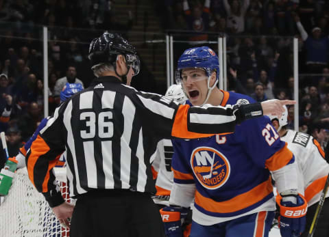 UNIONDALE, NEW YORK – MARCH 09: Anders Lee #27 of the New York Islanders argues with referee Dean Morton #36 during the second period against the Philadelphia Flyers at NYCB Live’s Nassau Coliseum on March 09, 2019 in Uniondale, New York. (Photo by Bruce Bennett/Getty Images)