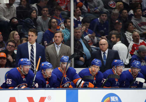 UNIONDALE, NEW YORK – OCTOBER 04: The New York Islanders coaching staff attend to bench duties during the game between the New York Islanders and the Washington Capitals at NYCB Live’s Nassau Coliseum on October 04, 2019 in Uniondale, New York. The Capitals defeated the Islanders 2-1. (Photo by Bruce Bennett/Getty Images)