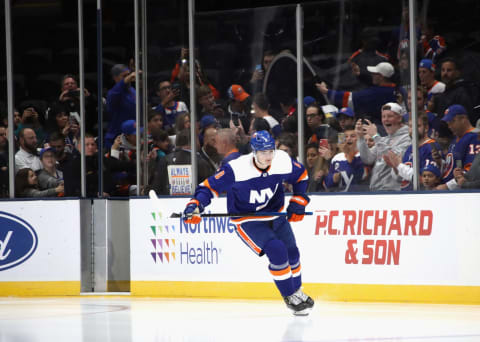 NEW YORK, NEW YORK – OCTOBER 08: Noah Dobson #8 of the New York Islanders leads the team out for warm-ups prior to playing in his first NHL game against the Edmonton Oilers at NYCB’s LIVE Nassau Coliseum on October 08, 2019 in Uniondale, New York. As part of the rookie initiation, the rest of the team gives the player a few laps before they join him. (Photo by Bruce Bennett/Getty Images)