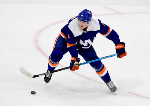 UNIONDALE, NEW YORK – OCTOBER 08: Noah Dobson #8 of the New York Islanders controls the puck during his first NHL game against the Edmonton Oilers at the NYCB’s LIVE Nassau Coliseum on October 08, 2019 in Uniondale, New York. (Photo by Emilee Chinn/Getty Images)