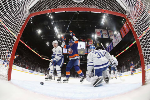UNIONDALE, NEW YORK – NOVEMBER 13: Mathew Barzal #13 and Brock Nelson #29 of the New York Islanders celebrate a power-play goal by Anthony Beauvillier #18 against Frederik Andersen #31 of the Toronto Maple Leafs at NYCB Live’s Nassau Coliseum on November 13, 2019 in Uniondale, New York. (Photo by Bruce Bennett/Getty Images)