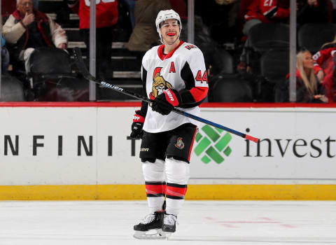 NEWARK, NEW JERSEY – NOVEMBER 13: Jean-Gabriel Pageau #44 of the Ottawa Senators celebrates his hat trick in the third period after he scored an empty net goal against the New Jersey Devils at Prudential Center on November 13, 2019 in Newark, New Jersey.The Ottawa Senators defeated the New Jersey Devils 4-2. (Photo by Elsa/Getty Images)